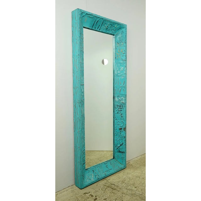This one of kind wall mirror is handcrafted using antique 100 year old tin ceiling tiles. This mirror is ready to ship....