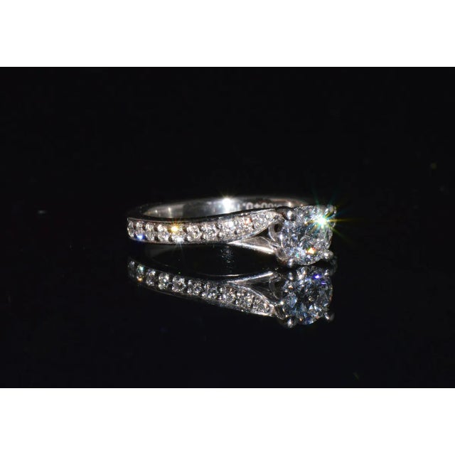 Genuine GIA certified 950 platinum 0.69CTS diamond ring. This gorgeous ring is set with a large GIA certified round...