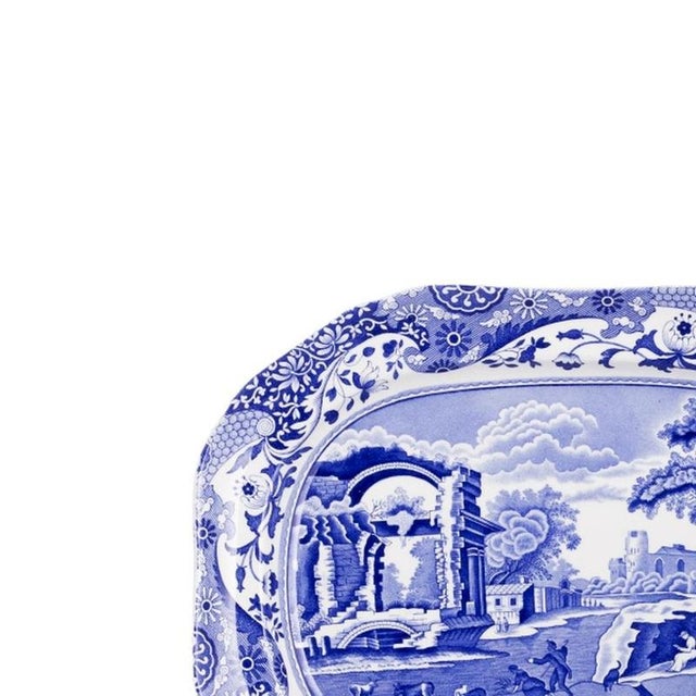 Set of five pieces in Spode earthenware. English; 20th century decoration in shades of blue depicting a landscape marked...
