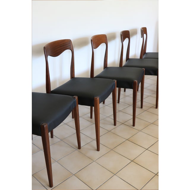Superb set of 5 chairs in the style of Scandinavian designer Niels Otto Møller (model no. 71). Teak frame and black vinyl...