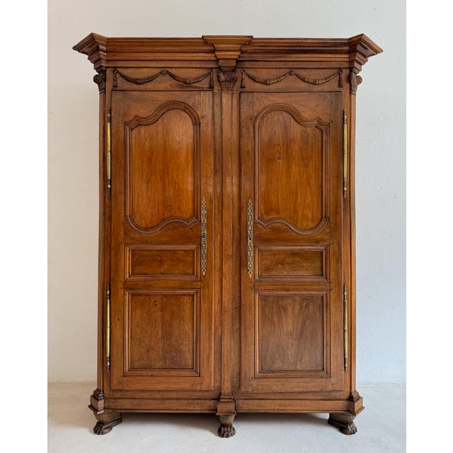 A stately wardrobe or hall cupboard from the second half of the 18th century. Transition / louis xvi period. Crafted from...