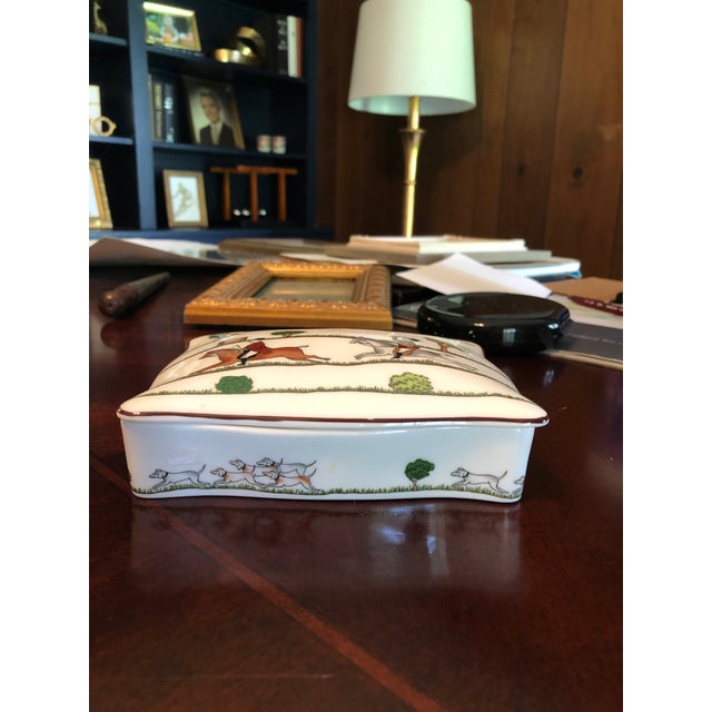 Cigarette box and lid by Crown Staffordshire in the pattern Hunt Scene. This item is in excellent condition with no crack...