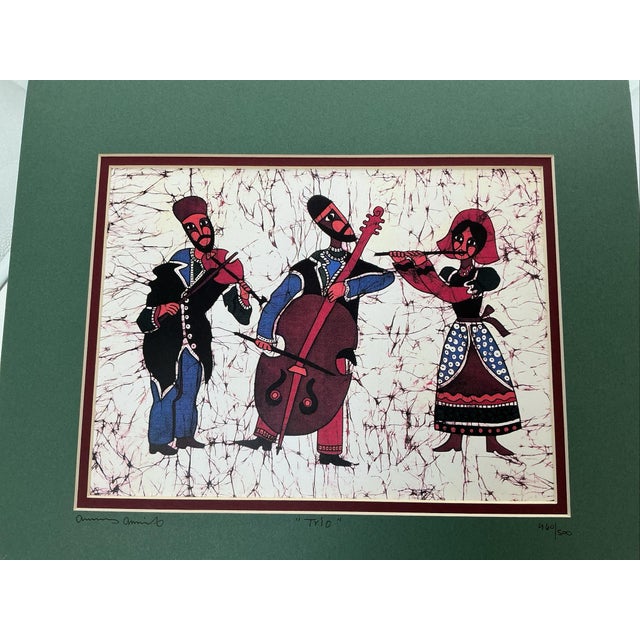 Beautiful signed and numbered Amos Amit “Trio” limited-edition batik print, number 460/500. This distinctive work...
