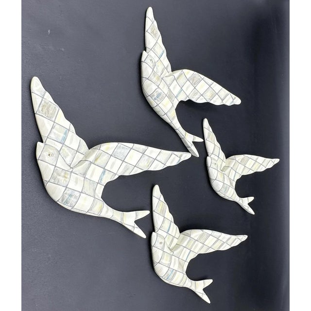 Each bird wall hanging measures approximately 7 inches long and 4 1/4 inches tall. Set of four MacKenzie Childs Small...