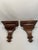 A handsome pair of hand carved Neoclassical Style wooden Corbels Wall Shelf Brackets with a rich walnut stain. Circa Mid...
