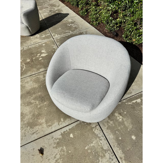 Practically brand new! West Elm "Cozy" swivel chair in gray upholstery. Excellent condition. •. West Elm fabric & color:...