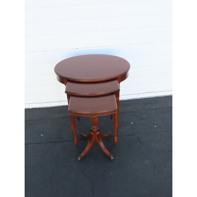 This brilliant set of 3 Nesting Tables is made of wood, solid wood, mahogany, and veneer. There are a total of 3 tables in...