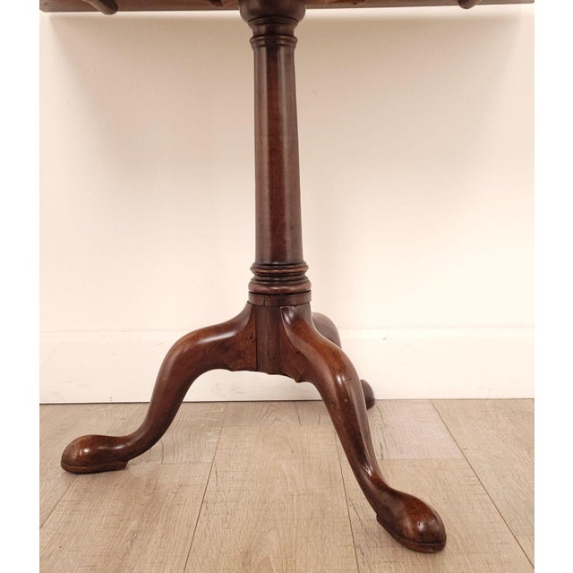 A George III tilt top mahogany rectangular tea table, circa 1790.
