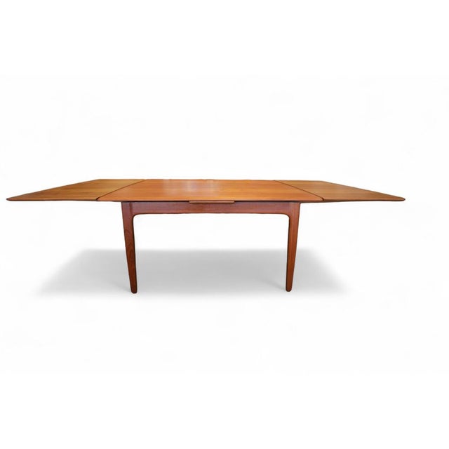 An incredibly well-made dining table designed by Svend Aage Madsen in Denmark and this table is a full 112 cm deep! The...