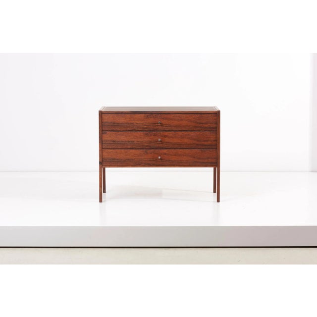 Wooden chest of drawers, model No. 34, manufactured by Aksel Kjersgaard in Denmark. Stamped. This piece is attributed to...