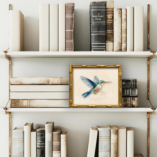 This is our blue hummingbird framed giclee print from our vintage "Garden Friends" series. Please note there are many...