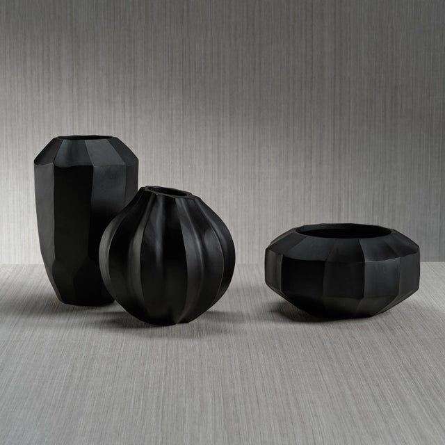 This uniquely textured vase sports a dramatic sawtooth cut pattern that will complement the soft shapes of any floral...