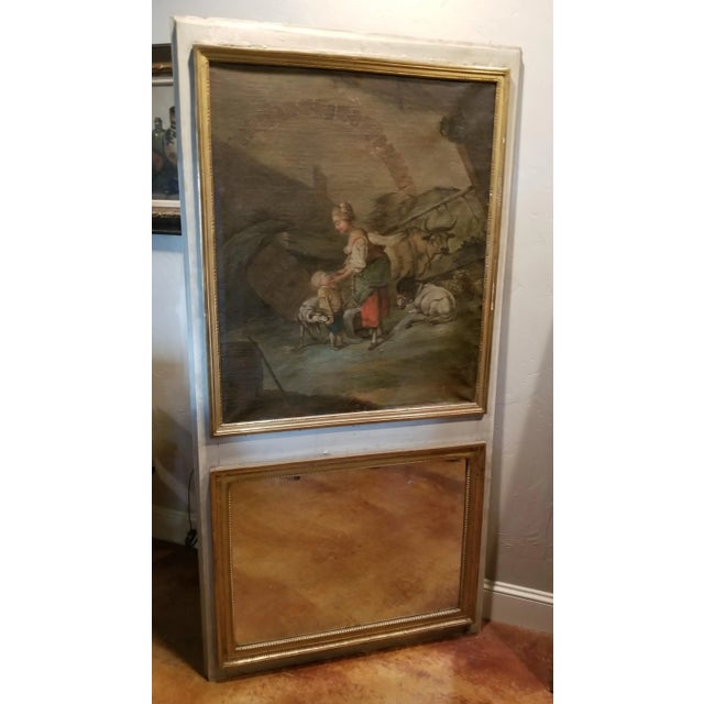 Beautiful antique country French painting of a young farm girl with animals mounted in an antique Trumeau mirror.