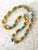Stunning collection of vintage beads, turquoise vintage amber glass and coral necklace. Designed by Matthew Izzo fall...
