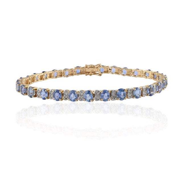 Metal Tennis Bracelet With Blue Sapphire and Diamonds Set in Solid 14k Yellow Gold For Sale - Image 7 of 8