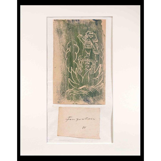 Man in pot is a woodcut print realized by Michel Fingesten in 1930s. Above the woodcut representing a man with one hand...