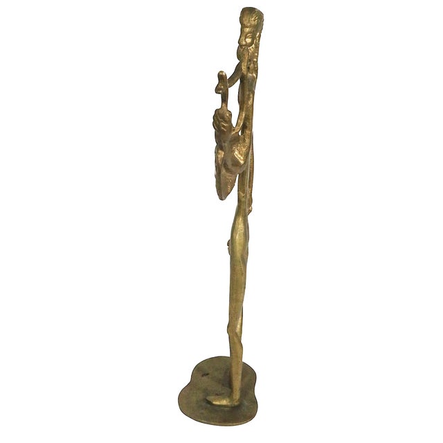 Cast brass figure depicting a male figure carrying a Poseidon basket - executed in the Antiquity style, made in the...