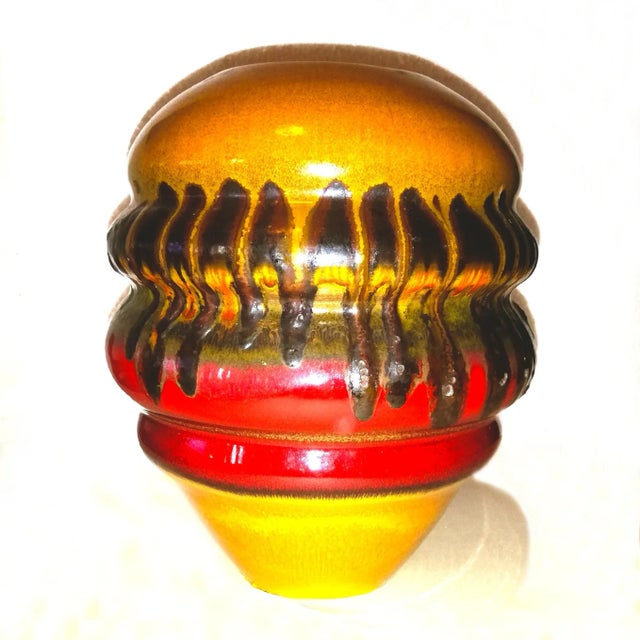 - Vintage ceramic vase - Comes in yellow, red, and brown hues - Dates from the 1960s - Produced in Italy - Signed 'G.C.' -...