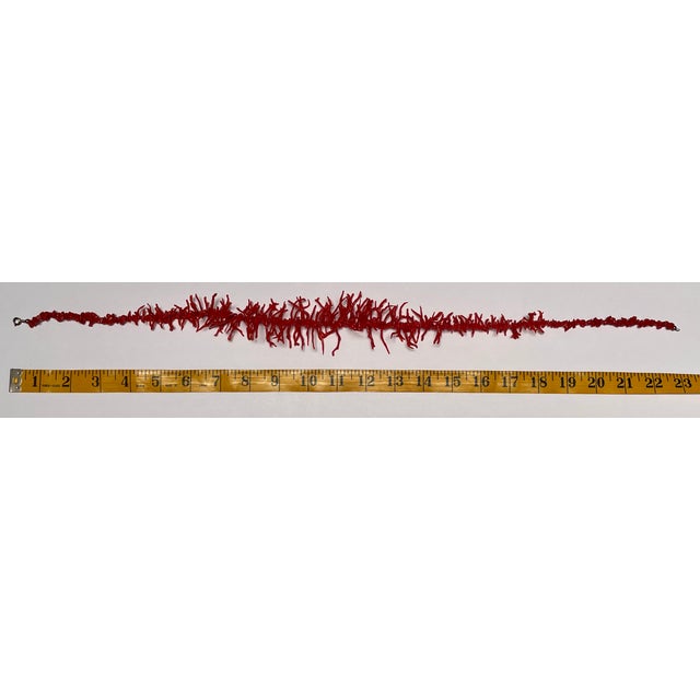 This is a classic graduated 23” necklace of branch coral. The pieces range from nugget-sized to 1.5”. It has a simple...