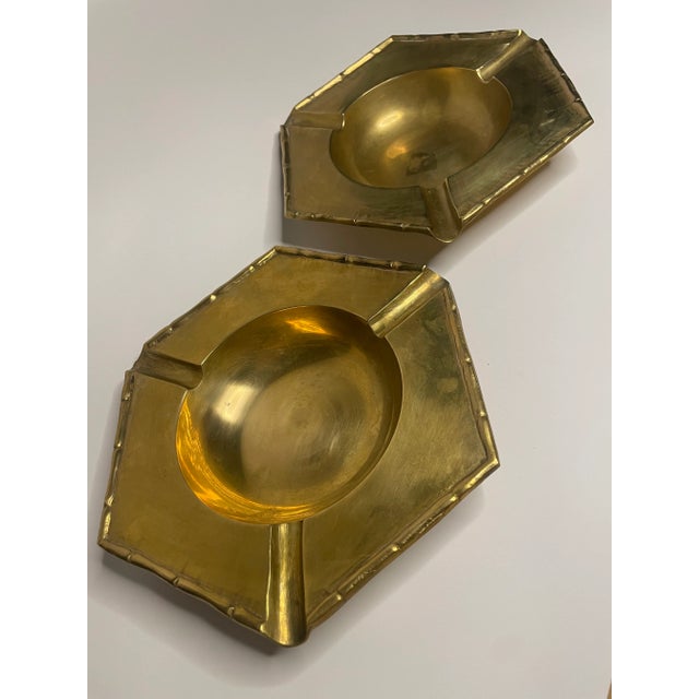This pair of brass Mid Century Modern catchall or ashtray has unique hexagonal shape. The finish is soft brass, clean with...