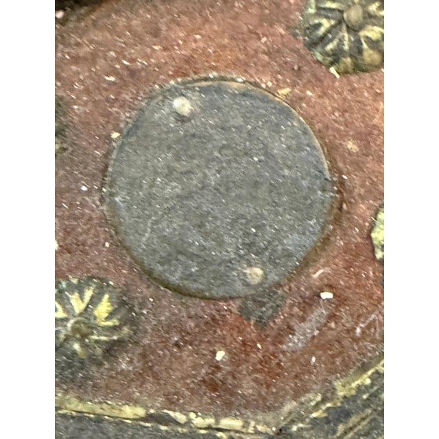 A North African likely Taureg Moroccan large charger. It is carved out of a native wood and the covered in a hand hammered...