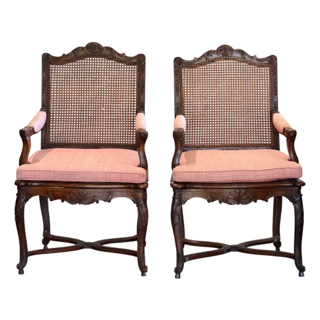 19th Century Pair of Carved French Walnut Armchairs With Caned Backs For Sale