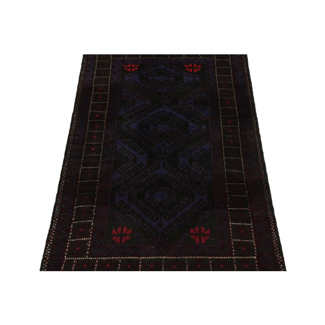 Hand knotted in wool, this 4x6 Baluch rug represents a new line of tribal carpets in the Modern Classics Collection by Rug...