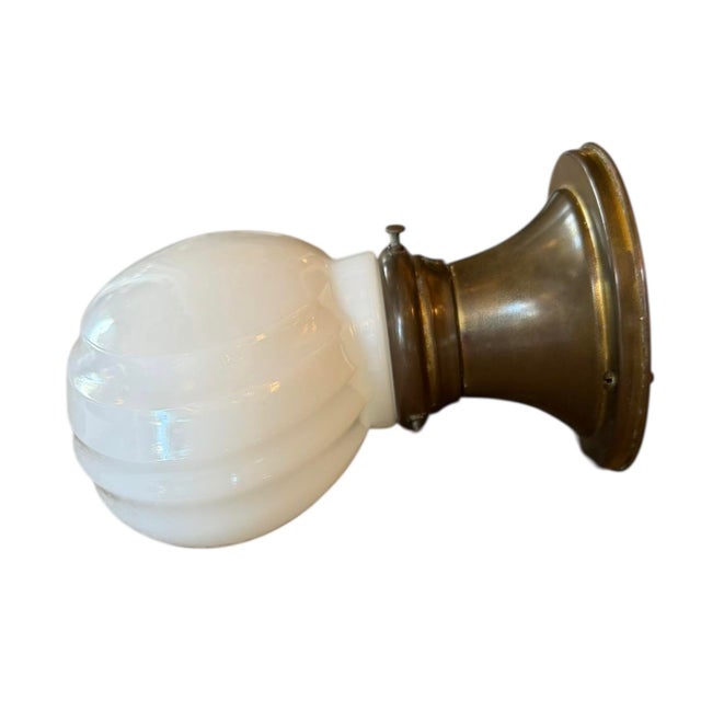 A rare find! Vintage clamshell milk glass lampshade is a wonderful ode to the mid 20th Century. Perfect in an office,...