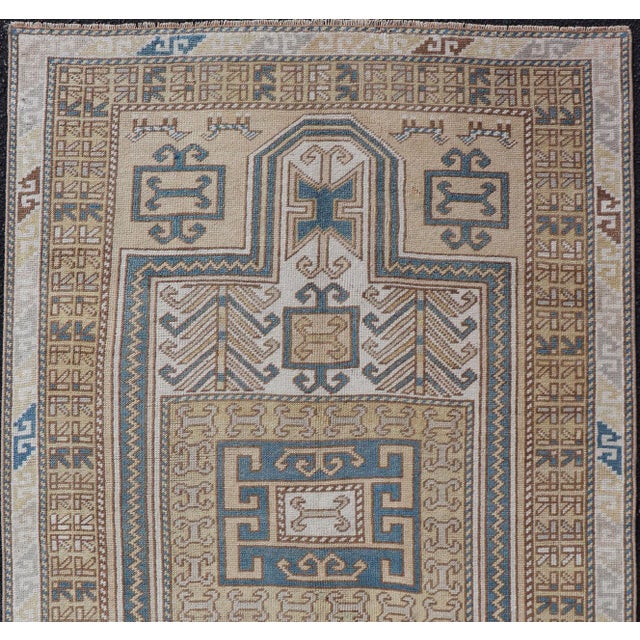 Measures: 3'5 x 5'8 Vintage Turkish Medallion Oushak Rug in Blue, Mocha, and Taupe. Country of Origin: Turkey; Type:...