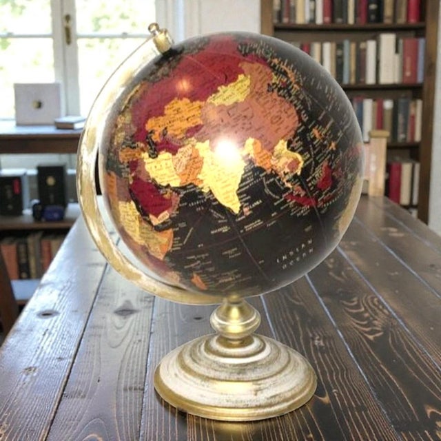 Black Old World 10" Tabletop Globe on Distressed Gold Metal Base 17" Tall Striking vintage-style world globe with black...
