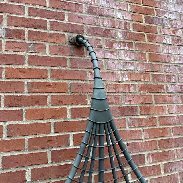 The Satala is made of galvanized metal, painted in a bronze-like shade. Satala is a sculptural furniture piece, a hammock...