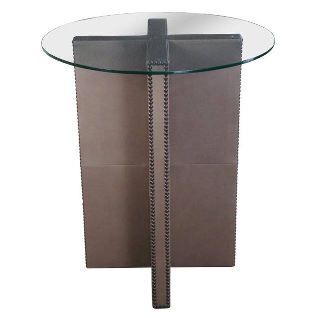 Pair of Brown Leather "X" form handmade pub or bistro tables. Features nailhead trim and round polished glass tops....