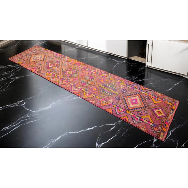 Offered is an one of a kind Kurdish runner rug, made in Anatolia approximately 50-60 years ago. The beautiful wool on wool...