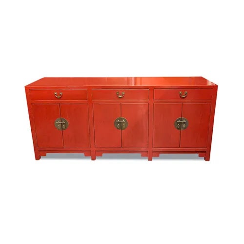 An amazing and beautiful Red Long buffet table with lots of storage. It has 3 drawers and 6 doors and 1 removable shelf on...