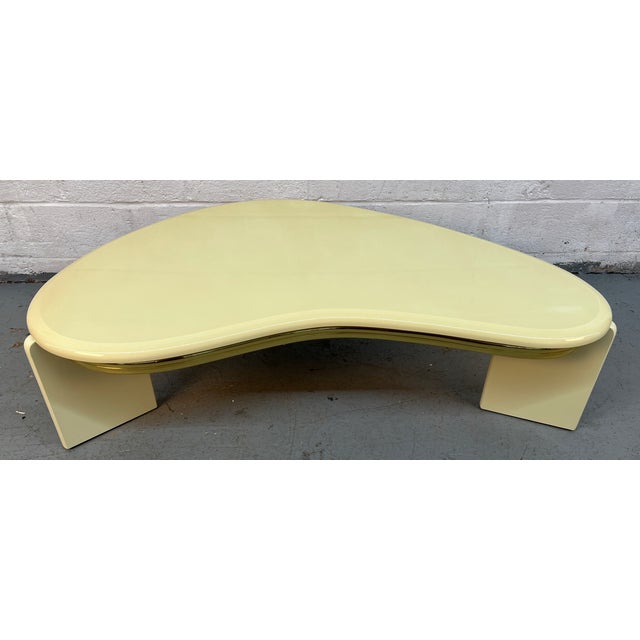 Make a bold statement with this vintage 1980s modernist cocktail table, a striking piece defined by its sculptural form...