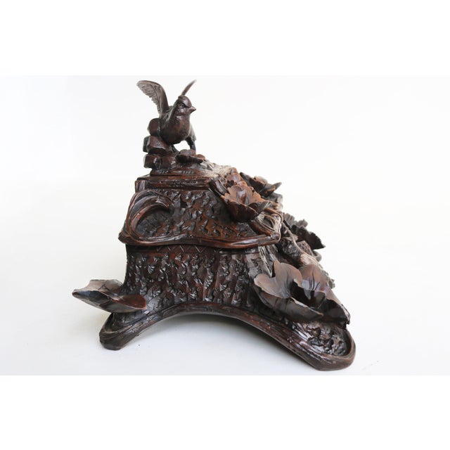 This incredibly rare two-tier Swiss Black Forest jewelry box is fully hand-carved from a single block of wood, making it a...