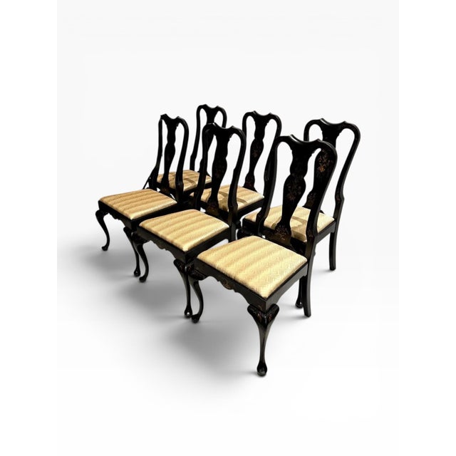 This gorgeous set of six dining chairs seamlessly blends the elegance of Queen Anne form with the decorative richness of...
