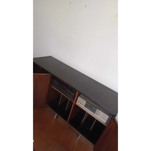 Handsome vintage mid-century modern credenza from the 1960s-1970s, originally designed as a stereo/audio console. Crafted...