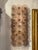The product is a pair of Murano fume glass disc sconces,. These sconces would add a touch of elegance and uniqueness to...