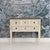 A beautiful antique French Louis XVI style painted commode in original paint, standing on elongated tapered legs with...
