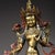 This is a finely crafted antique gilt bronze sculpture of Green Tara, a revered female Bodhisattva in Tibetan Buddhism...
