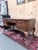 An exceptional Ethan Allen executive desk that embodies the timeless sophistication of traditional Georgian and English-...