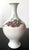 A porcelain vase with dragon design by Japanese imperial potter Makuzu Kozan (1842-1916), circa 1900s. The vase is made in...