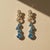 Metal Drop Earrings With Natural Sky Blue Topaz, Silver, Gold, Pair For Sale - Image 7 of 7