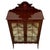An elegant early 20th-century English display cabinet, finely crafted from mahogany and distinguished by delicate...