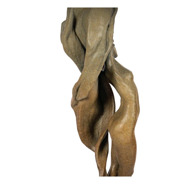 Karl Jensen (20th/21st Century) Creative Fire Patinated bronze figural sculpture depicting a female form captured in an...