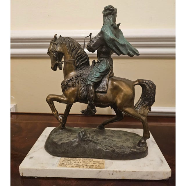 A Late 19th french verdigris bronze group of Arab Hunter on Horseback. Cast from the model by Alfred Barye and Emile...