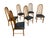 Elevate your dining space with this striking set of six vintage Danish Modern teak spindle back dining chairs, crafted...