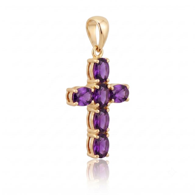 This pendant features a timeless Latin cross design, crafted with six matched gemstones arranged in an open-back setting...