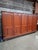 Large vintage wooden laboratory cabinet from Berlin, featuring 52 spacious drawers concealed behind doors. Originally used...